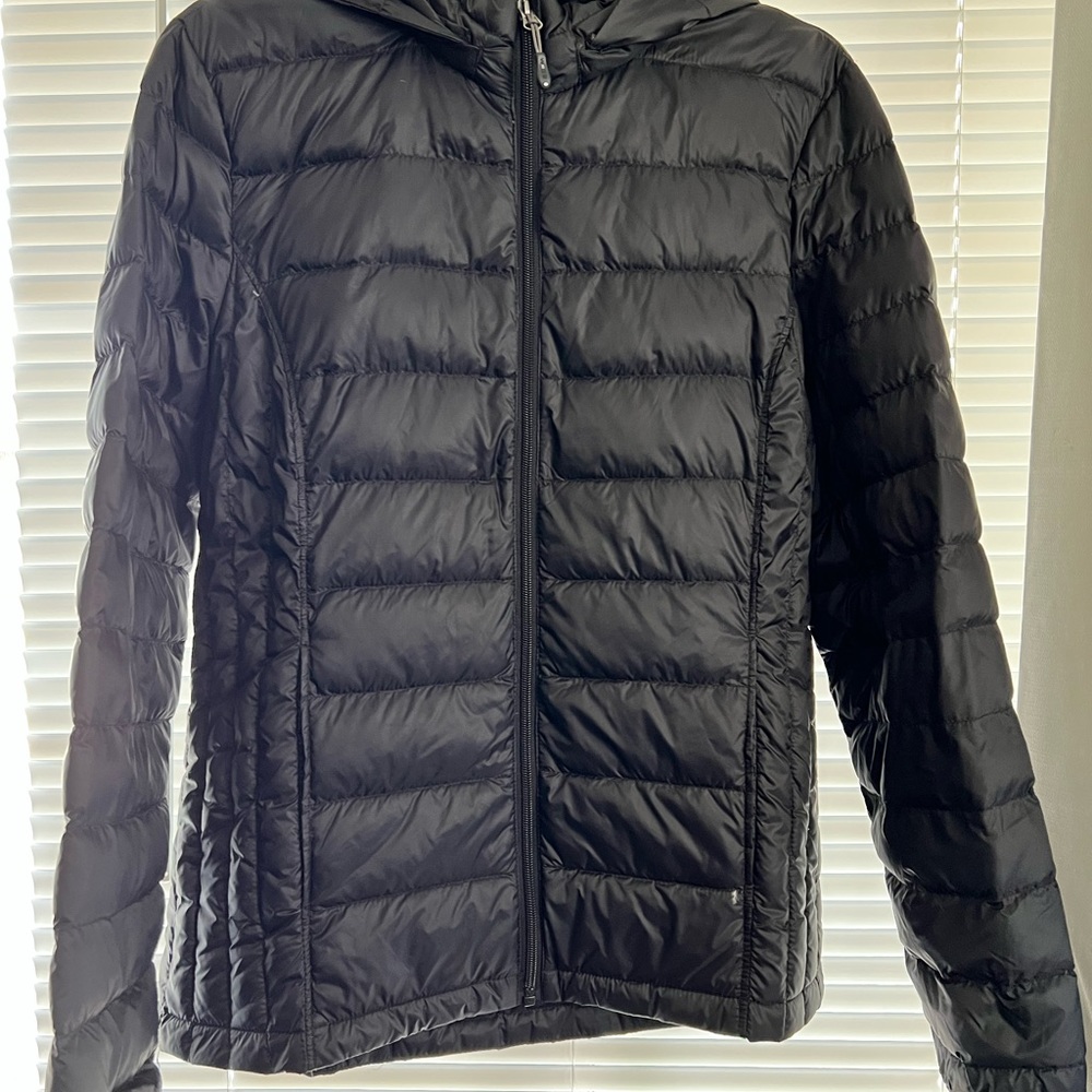 Woman’s black light puffer jacket